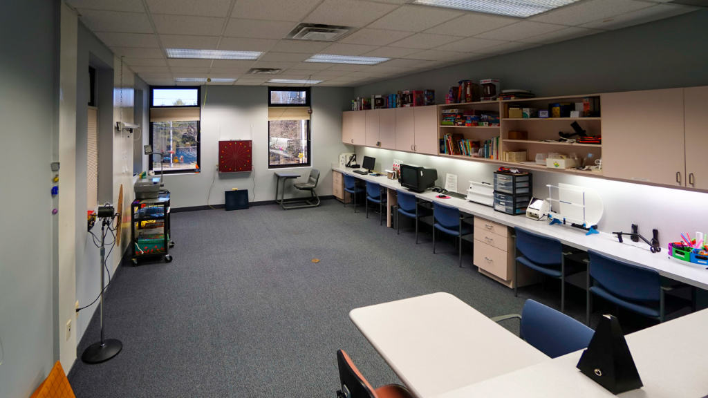 PressVision vision-therapy room with work tables and equipment